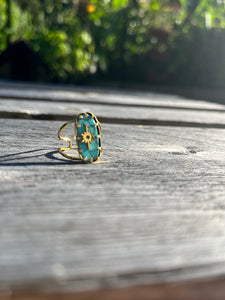 bague bleu turquoise avec un logo soleil, bague ajustable 